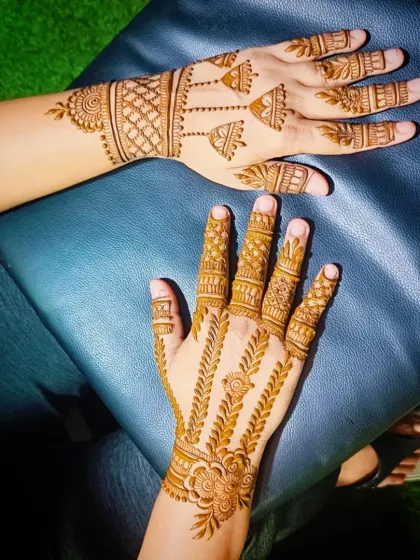 This photo shows the designs from the side, highlighting the finger details.