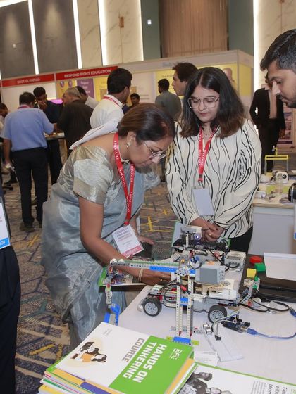 An educator interacts with one of our hands-on robotics kits at the EGN India expo. We focus on providing practical, engaging tools for learning.