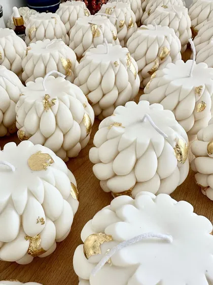 The beautiful braided soy candles with gold leaf accents before being boxed up.