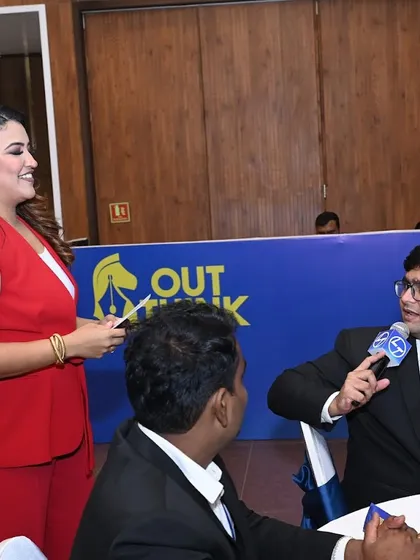 Interacting with an audience member, getting their perspective during the L&T competition.