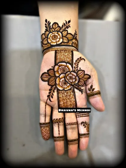 A modern design featuring a bold floral strip down the center of the palm. This is a great option for someone who wants a contemporary look.