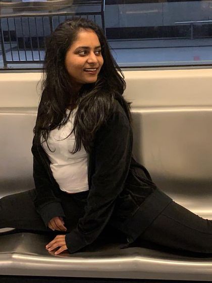Who says you can't practice your splits on the metro? A dancer finds space to stretch anywhere. It's all about having fun with your passion.