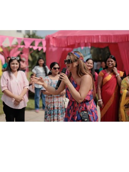 Engaging with the ladies of the family during a Mehendi function. I love creating a comfortable and fun atmosphere where everyone feels like they can join in.