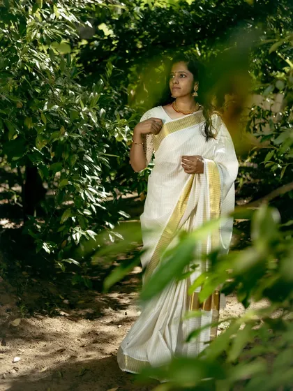 Another photo from my Onam series, capturing a quiet moment in nature. The light and greenery are a beautiful backdrop.