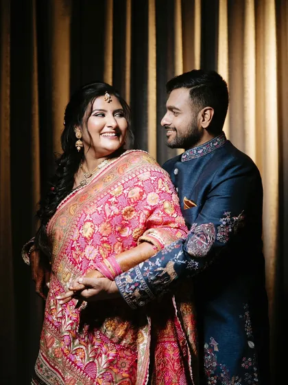 A story of love, beauty, and transformation. This artistic shot captures the couple in a beautiful, intimate moment.