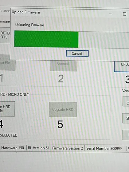 Routine maintenance is key to reliability. Here, we are performing a firmware update on our Creamsource SpaceX fixtures to ensure they have the latest features and perform flawlessly on every job.