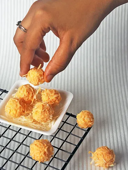 For a unique fusion treat, I created this Mango Rasgulla Truffle. It's an exquisite blend of traditional rasgulla and luscious mango white chocolate, offering a burst of tropical delight.