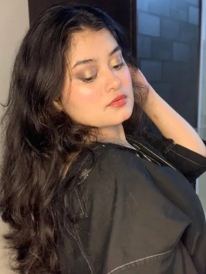 This look is all about natural, radiant beauty with a glossy lip.