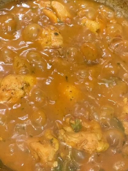 My chicken masala curry bubbling away on the stove.