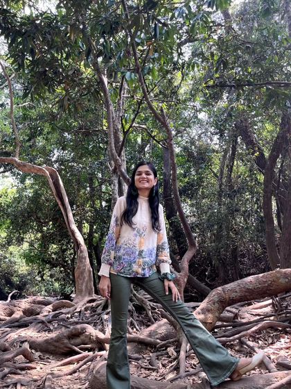 Posing among the incredible roots of an old tree. The gnarled, ancient forms in nature tell such powerful stories.