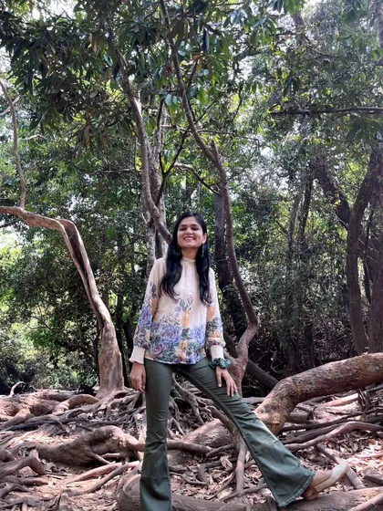 Posing among the incredible roots of an old tree. The gnarled, ancient forms in nature tell such powerful stories.