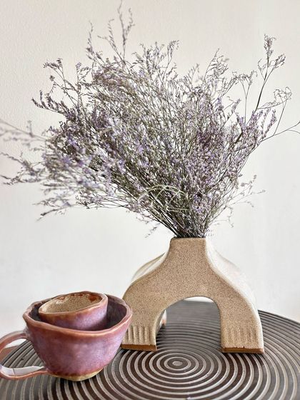 A beautiful arch vase, fresh out of the kiln. This was a personal project, exploring hand-building techniques.