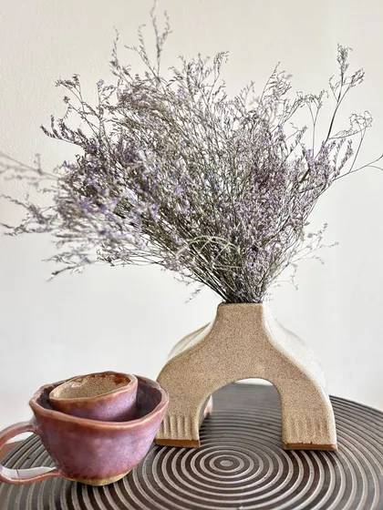 A beautiful arch vase, fresh out of the kiln. This was a personal project, exploring hand-building techniques.