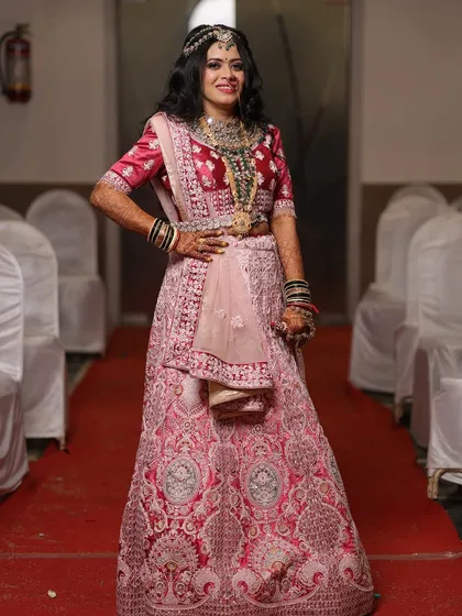A full-length view of the engagement outfit, showing how the makeup and styling create a cohesive and stunning look.