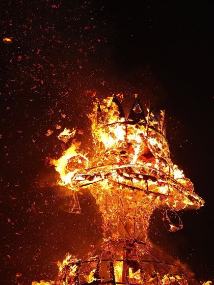 The head of the Ravana effigy burns intensely, symbolizing the triumph of good over evil.