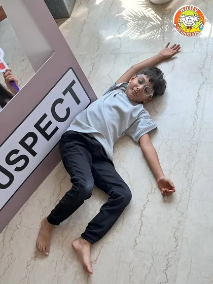 Case closed, and the suspect is down! The playful drama of a crime scene investigation makes for hilarious and memorable moments during the party.