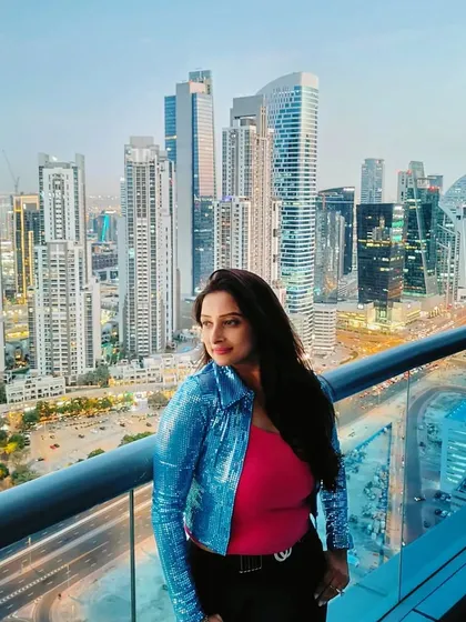 Hosting events takes me to incredible places. This shot from a successful event in Dubai, with the city's stunning skyline in the background, showcases my experience as a global destination event host, ready to bring your celebration to life anywhere in the world.