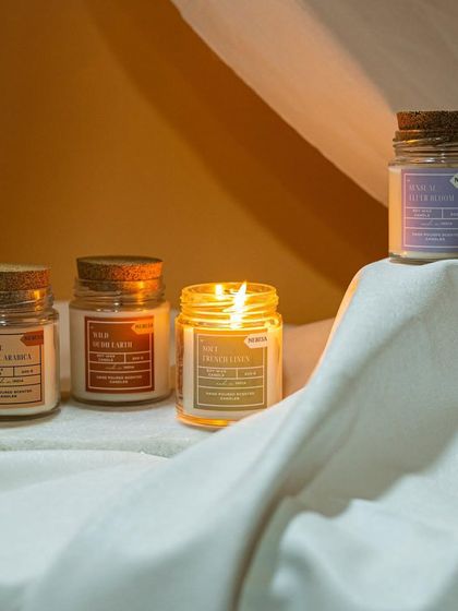 This image showcases a few of my favorite scented jar candles. From the fresh "Soft French Linen" to the rich "Wild Oudh Earth," there is a fragrance for every mood and every room in your home.