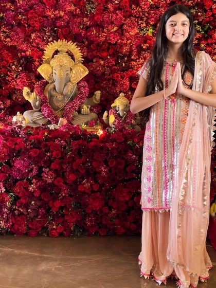 Here is one of Dabboo Ratnani's daughters posing beautifully in my peach sharara set during Ganesh Chaturthi. The intricate embroidery and soft color make it a perfect festive choice.