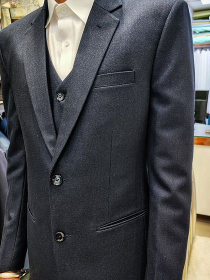 A collection of our clients in their custom-tailored formal suits, showcasing different fabrics and fits for various professional and formal occasions.