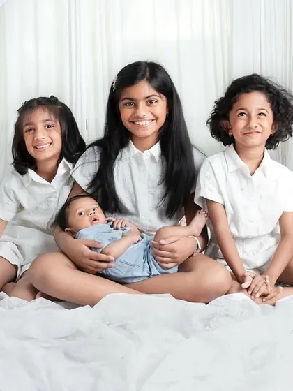 A beautiful portrait of sisters and their new baby brother. Capturing these group sibling shots is always a joy and creates a memory they will all look back on for years.