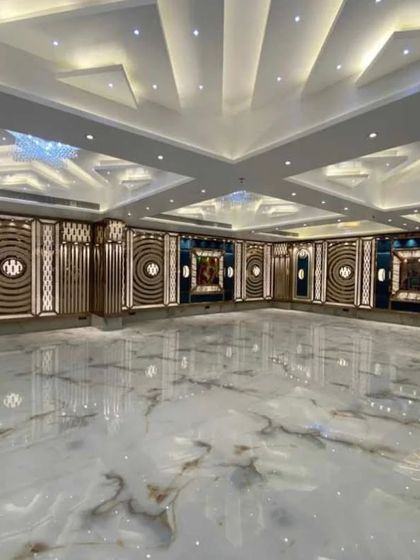 This photo highlights the stunning ceiling design and spaciousness of the newly opened Grand Utsav Banquet in Kharghar.