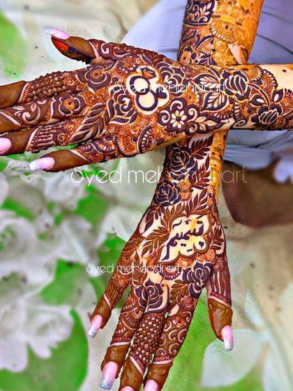 An engagement design featuring the couple's names and interlocking rings.