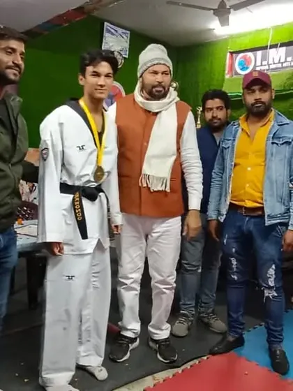 My Hapkido champion with his medal. I am proud to offer training in multiple martial arts disciplines.
