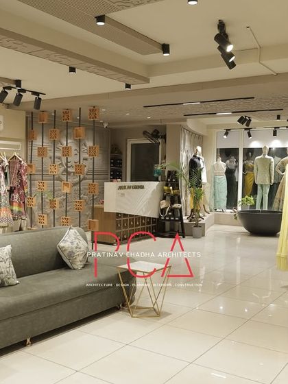 A long view of the studio, showing the different zones for seating, display, and consultation.