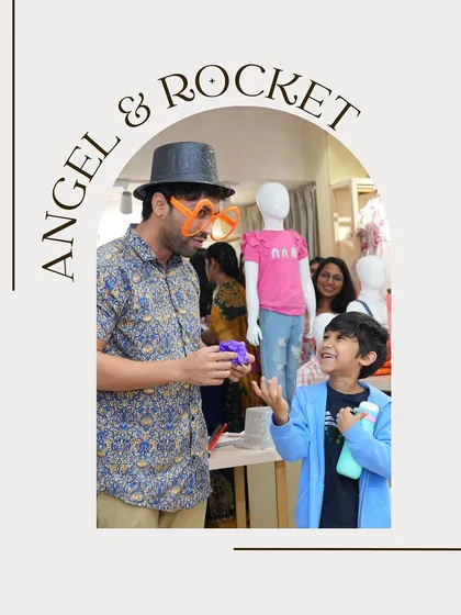 I love getting the kids involved, and sometimes that means being a little silly. Here’s me making a new friend and assistant during a show at the Angel & Rocket store.