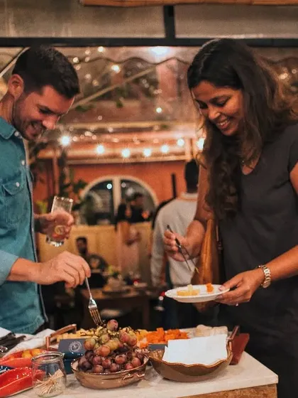 The true measure of success is seeing guests delight in the food and company. Here, guests enjoy a custom grazing station at an outdoor brand launch, showcasing how my catering services create a relaxed and engaging social atmosphere.