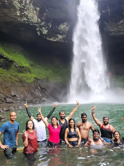The happy group celebrating in the emerald green waters of Devkund waterfall. This is one of the highlights of my Maharashtra trip.