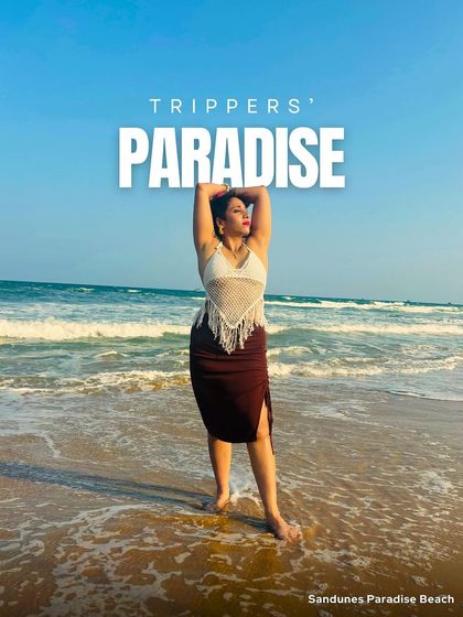 A traveler enjoying her paradise at Sandunes Paradise Beach in Pondicherry. Our trips are all about finding those perfect spots to relax and be yourself.