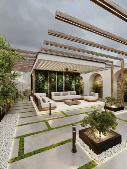 This terrace is designed as a serene urban escape. The design incorporates a wooden pergola for partial shade, a lush vertical garden wall, and carefully placed planters to blend nature with modern comfort. It’s the perfect setting for both quiet relaxation and social gatherings.