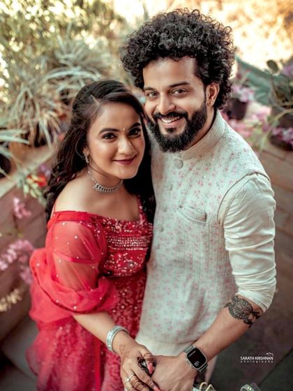 A beautiful couple portrait. The bride's soft glam makeup and romantic hairstyle make her look effortlessly beautiful.