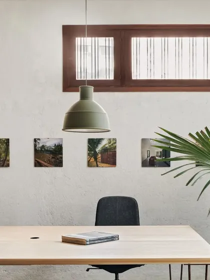 Muted hues, natural light, and a touch of greenery. These are the core elements that define the calm and focused atmosphere of our workspace.