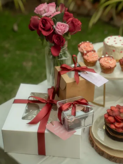 Capturing the details of Valentine's Day gift packaging, complete with satin ribbons and gift tags. These shots are essential for e-commerce sites where customers want to see the full gifting experience.