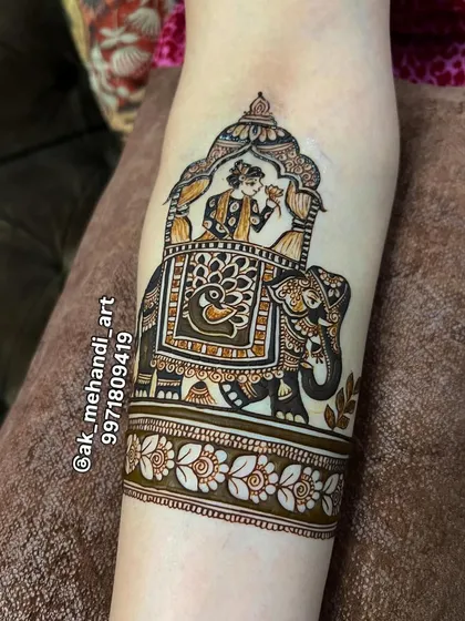 Figurative work tells a story. This design features a royal elephant with a 'howdah', a classic element in traditional Indian bridal art that symbolizes prosperity and celebration.