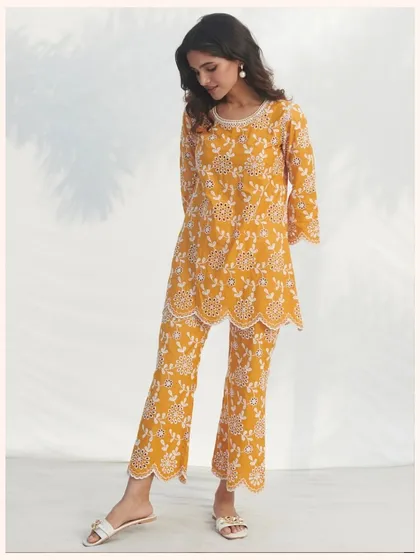 Another look at my popular mustard yellow embroidered co-ord set. The flared pants and matching top create a flattering and stylish silhouette.