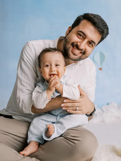 A sweet moment between father and son during the hot-air-balloon shoot. These connected moments are just as important as the posed shots.