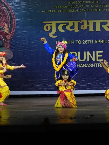 A dynamic lift from "PREMA VINOD," where the dancers create a visually striking pose. Our choreography often includes such formations to create memorable stage moments.