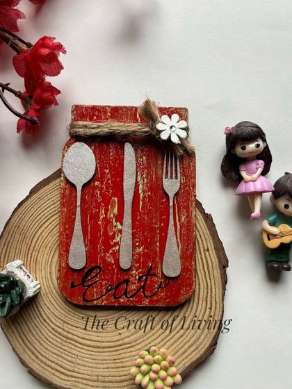 A matching jar-shaped wooden magnet with an "Eat" theme, perfect for a kitchen decor set.