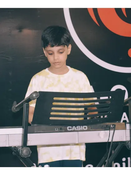 A student at his Casio keyboard during a practice session at the academy. I provide quality instruments for students to learn on.