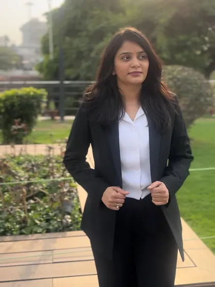 A confident stance during an outdoor break. My reputation is built on results, and I carry that with me everywhere I go.