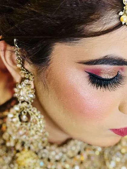 This is a close-up of a dramatic volume lash set, perfect for a bride. I hand-make each fan to create this full, glamorous effect that photographs beautifully and makes your eyes the center of attention.