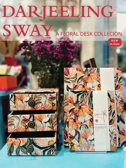 The 'Darjeeling Sway' floral desk collection, ready to bring a soft burst of joy to your space. The set includes a three-drawer organizer and matching keepsake boxes.