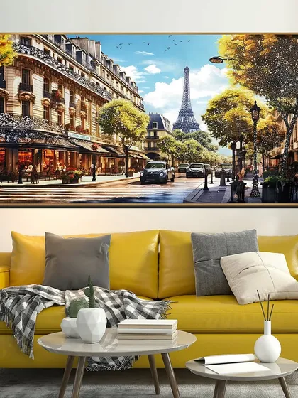 This crystal glass painting captures a romantic Parisian street scene with the Eiffel Tower in the distance. The warm, sunny tones and sparkling details bring the city of love right into your living room.