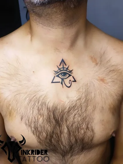 This Eye of Providence tattoo on the chest is a powerful symbol of guidance and divine watchfulness. The clean, bold lines create a striking and iconic image.