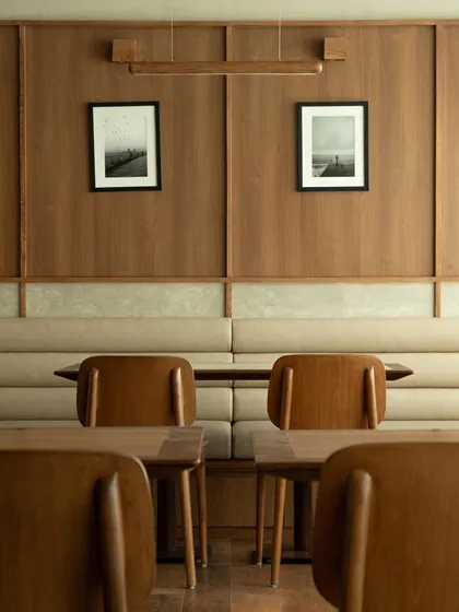 A frontal view of the banquette seating, emphasizing the clean lines and minimalist aesthetic.