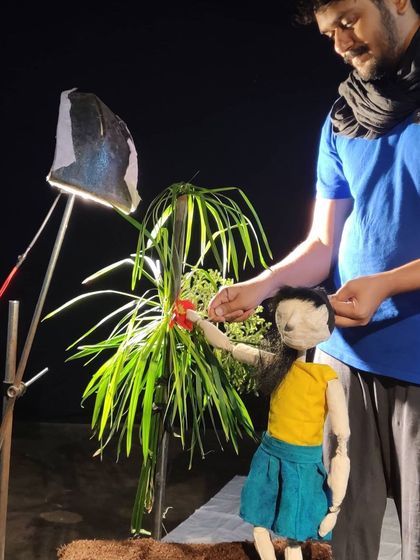 A wider view of our outdoor, nighttime setup for a new project. We often use simple, focused lighting to create a dramatic stage for our puppets.